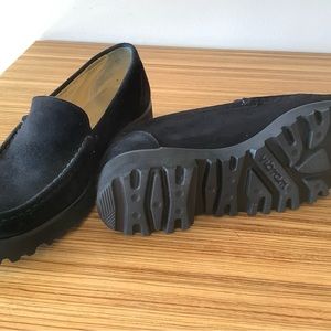 Ron White black suede lug sole loafers.